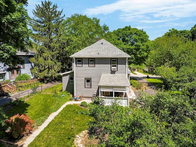 2312 Maple Ave, Leavenworth, KS 66048 - rear view of property with roof with shingles and a chimney