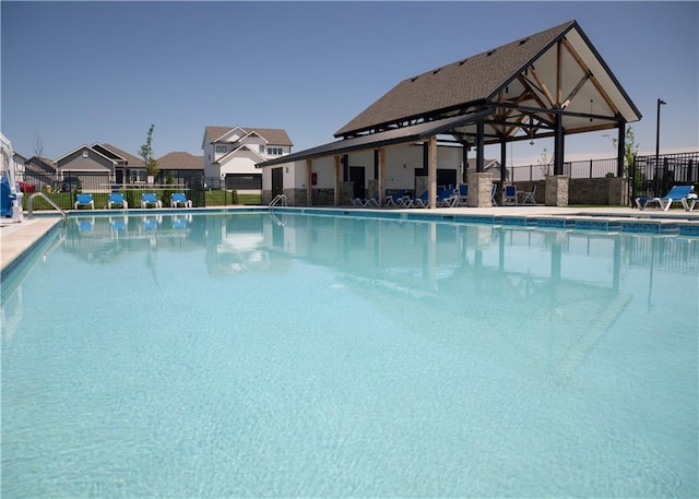 pool featuring fence