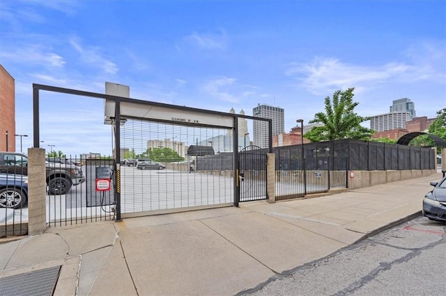 view of gate featuring fence