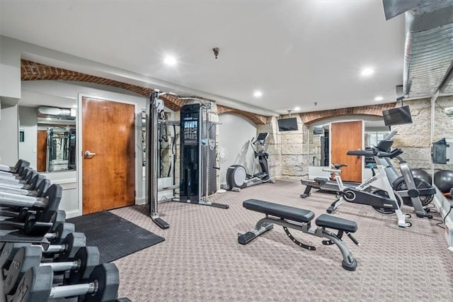 gym featuring recessed lighting and carpet
