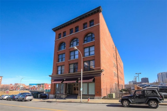 view of building exterior featuring a city view