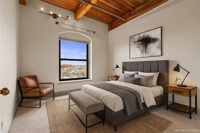 609 Central St Unit 1501, Kansas City, MO 64105 - bedroom featuring a wood ceiling with exposed beams and light carpet