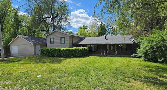 6004 Amazonia Rd, Saint Joseph, MO 64505 - view of front of house featuring covered porch and a front lawn
