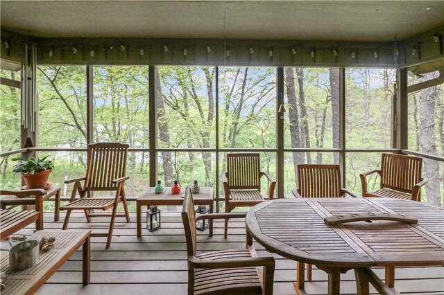 12 Woodland Trl, Warrensburg, MO 64093 - sunroom with outdoor dining space and healthy amount of natural light