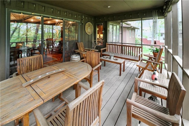 12 Woodland Trl, Warrensburg, MO 64093 - sunroom / solarium featuring outdoor dining space