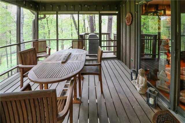12 Woodland Trl, Warrensburg, MO 64093 - sunroom featuring outdoor dining space and a relaxing sauna