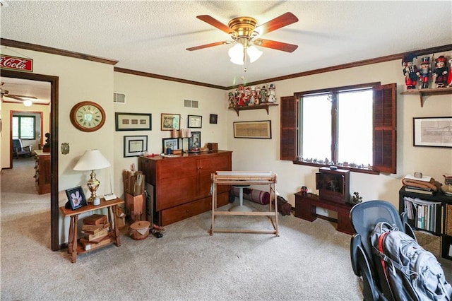 12 Woodland Trl, Warrensburg, MO 64093 - living area featuring ceiling fan, carpet floors, healthy amount of natural light, a textured ceiling, and crown molding