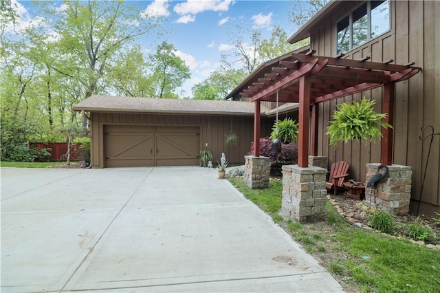 12 Woodland Trl, Warrensburg, MO 64093 - garage with driveway