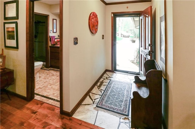 12 Woodland Trl, Warrensburg, MO 64093 - foyer entrance with baseboards and wood finished floors