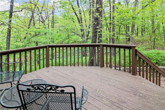 12 Woodland Trl, Warrensburg, MO 64093 - deck with a wooded view