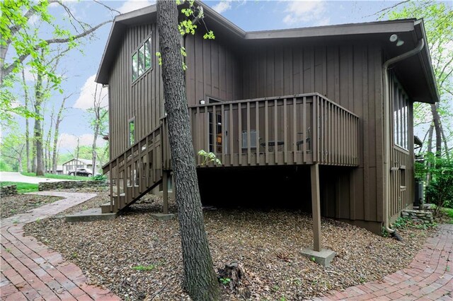 12 Woodland Trl, Warrensburg, MO 64093 - view of side of property featuring a deck