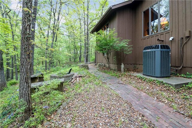 12 Woodland Trl, Warrensburg, MO 64093 - view of yard featuring central air condition unit