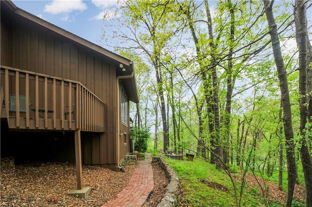 12 Woodland Trl, Warrensburg, MO 64093 - view of property exterior with a wooden deck