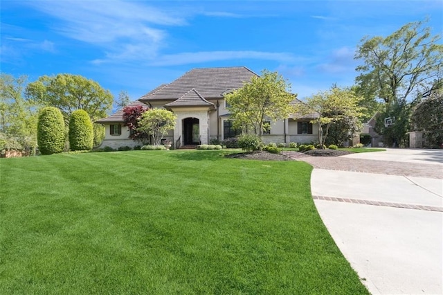 1901 Stratford Rd, Mission Hills, KS 66208 - french provincial home with a front yard and stone siding