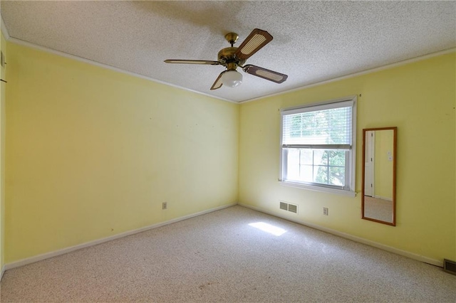 12012 Ensley Ln, Leawood, KS 66209 - carpeted spare room with crown molding, a textured ceiling, ceiling fan, and baseboards