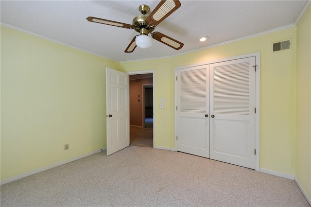12012 Ensley Ln, Leawood, KS 66209 - unfurnished bedroom with carpet, crown molding, a closet, recessed lighting, and baseboards