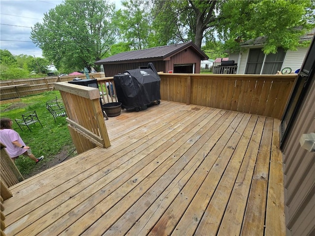 1824 S Grand Ave, Sedalia, MO 65301 - wooden terrace with fence and grilling area