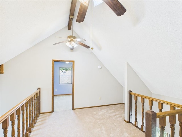 additional living space featuring ceiling fan, carpet floors, and baseboards
