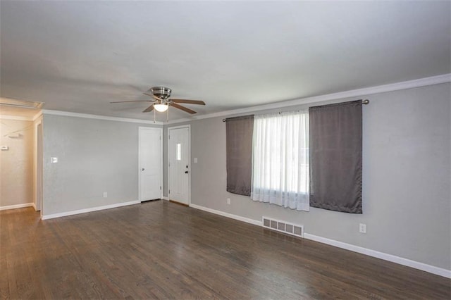 unfurnished living room featuring crown molding, ceiling fan, visible vents, and wood finished floors