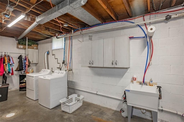 basement with washer and clothes dryer