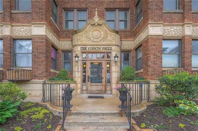 807 W 48th St Unit 302, Kansas City, MO 64112 - property entrance featuring brick siding