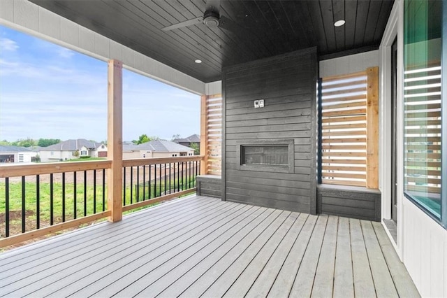 2608 NE Amanda Ln, Blue Springs, MO 64029 - wooden deck featuring ceiling fan and a residential view