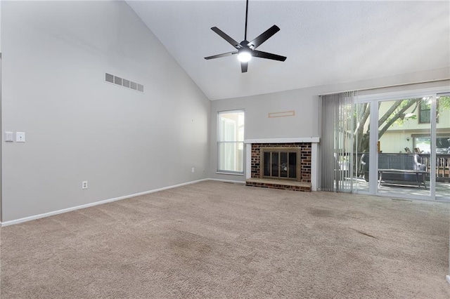 unfurnished living room featuring high vaulted ceiling, a ceiling fan, carpet, a brick fireplace, and baseboards