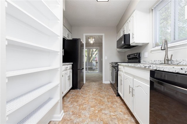 kitchen featuring black appliances, open shelves, white cabinets, and a textured ceiling