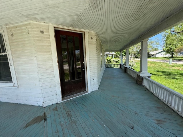 318 S Williams St, Craig, MO 64437 - deck with covered porch and a yard