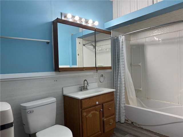 318 S Williams St, Craig, MO 64437 - full bathroom with toilet, wood finished floors, shower / tub combo with curtain, and vanity