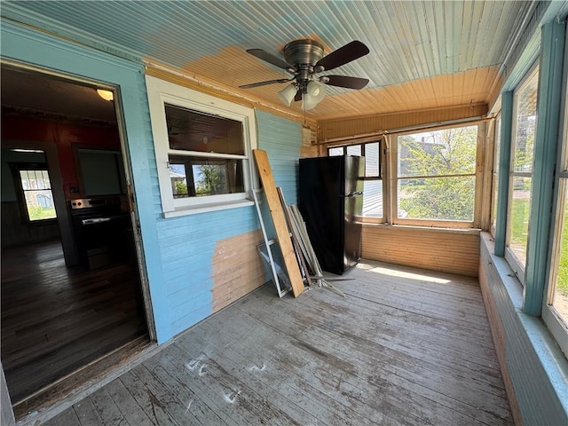 318 S Williams St, Craig, MO 64437 - unfurnished sunroom with a ceiling fan