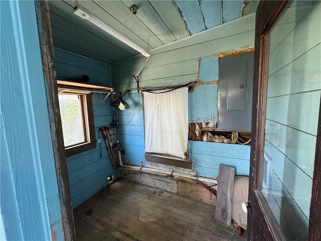 318 S Williams St, Craig, MO 64437 - miscellaneous room with wooden walls, wood ceiling, hardwood / wood-style flooring, and electric panel