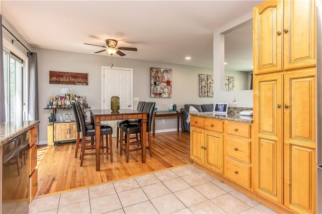 dining area featuring recessed lighting, a ceiling fan, light wood finished floors, and baseboards