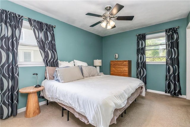 bedroom featuring baseboards, carpet, and a ceiling fan