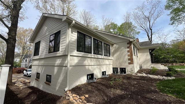 1639 Indiana St, Lawrence, KS 66044 - view of property exterior with central AC unit