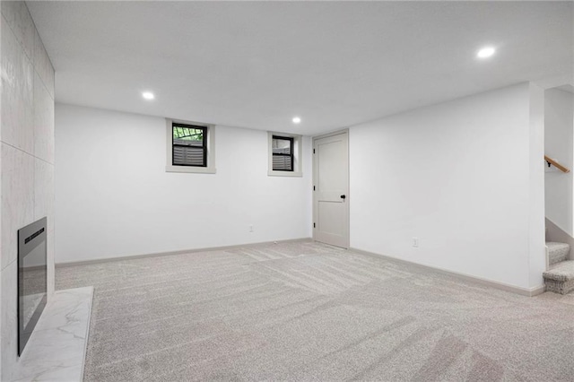 1639 Indiana St, Lawrence, KS 66044 - basement with stairs, carpet flooring, recessed lighting, and baseboards