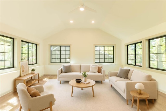 1639 Indiana St, Lawrence, KS 66044 - living area featuring light wood-style flooring, ceiling fan, healthy amount of natural light, lofted ceiling, and recessed lighting