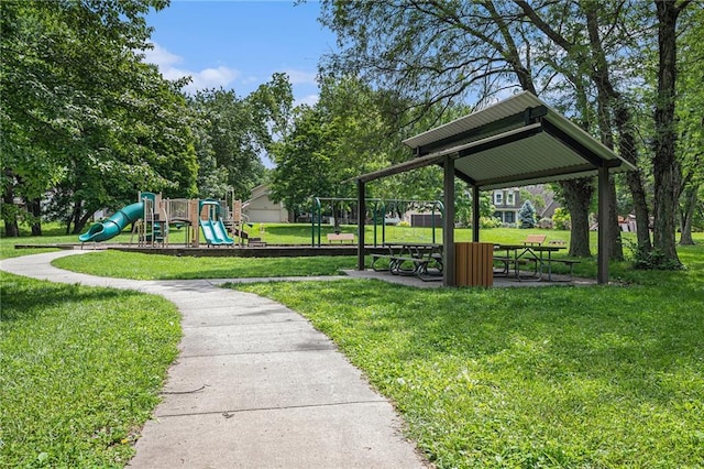 view of property's community with a lawn