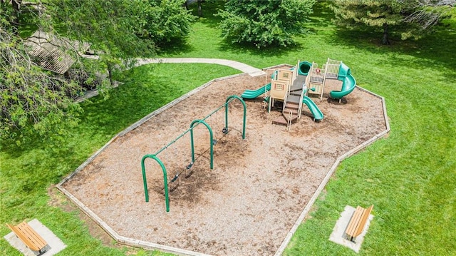 communal playground featuring a yard