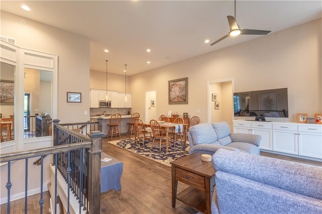 6529 Barth Rd, Shawnee, KS 66226 - living room with wood finished floors, ceiling fan, and recessed lighting