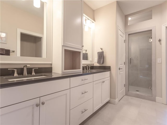 6529 Barth Rd, Shawnee, KS 66226 - full bath featuring baseboards, a shower stall, double vanity, and tile patterned flooring