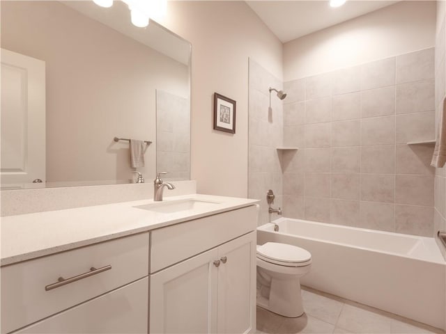 6529 Barth Rd, Shawnee, KS 66226 - full bathroom featuring toilet, tile patterned floors, vanity, and  shower combination