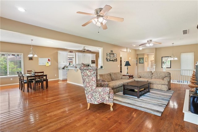 14 Emerald Shore Dr, Lake Tapawingo, MO 64015 - living area with a ceiling fan, wood finished floors, baseboards, and recessed lighting