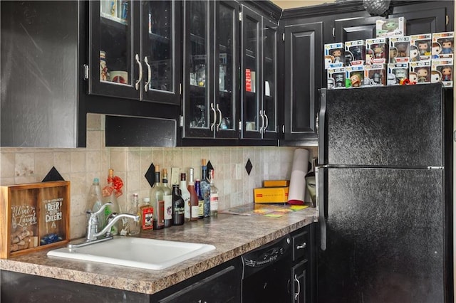 14 Emerald Shore Dr, Lake Tapawingo, MO 64015 - kitchen featuring black appliances, dark cabinetry, a sink, and glass insert cabinets