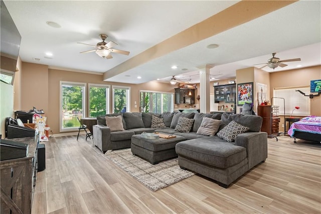 14 Emerald Shore Dr, Lake Tapawingo, MO 64015 - living room featuring a ceiling fan, light wood-style floors, decorative columns, and recessed lighting