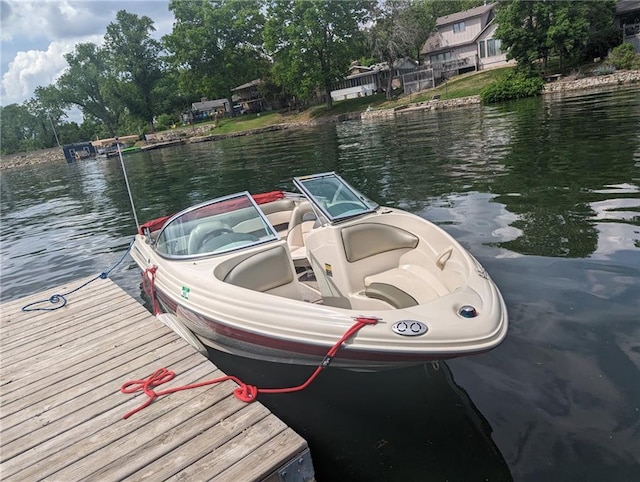 14 Emerald Shore Dr, Lake Tapawingo, MO 64015 - dock featuring a water view and view of wooded area