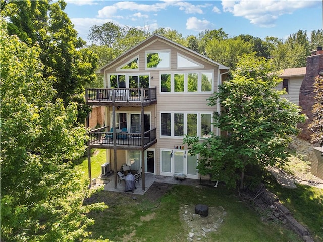 14 Emerald Shore Dr, Lake Tapawingo, MO 64015 - back of house with a patio area, central AC, a lawn, and a deck