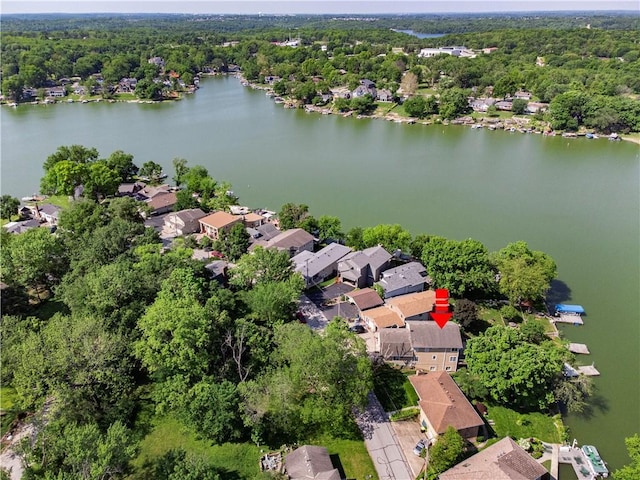 14 Emerald Shore Dr, Lake Tapawingo, MO 64015 - aerial view of property and surrounding area with a nearby body of water and a forest