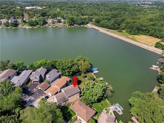 14 Emerald Shore Dr, Lake Tapawingo, MO 64015 - aerial perspective of suburban area featuring a large body of water and a forest
