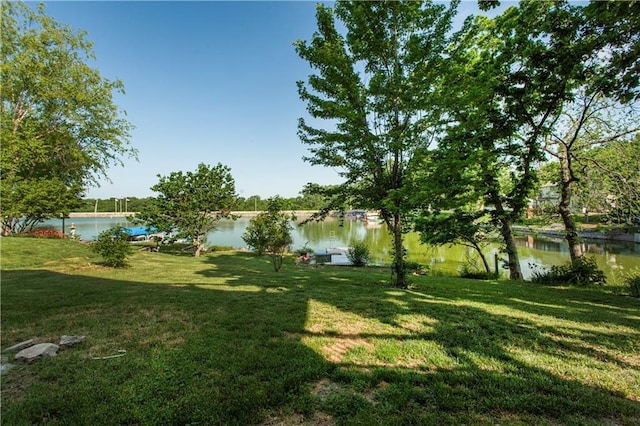 14 Emerald Shore Dr, Lake Tapawingo, MO 64015 - view of green lawn with a water view